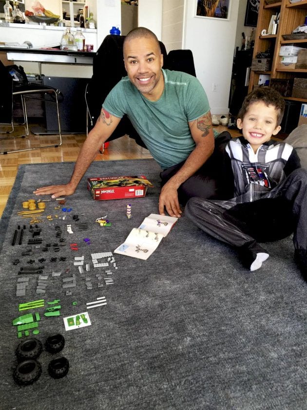 Dr. Mabrie and son playing Legos