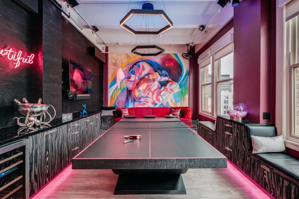 Mabrie Facial Institute's Lounge with ping-pong table, snacks, and city views.