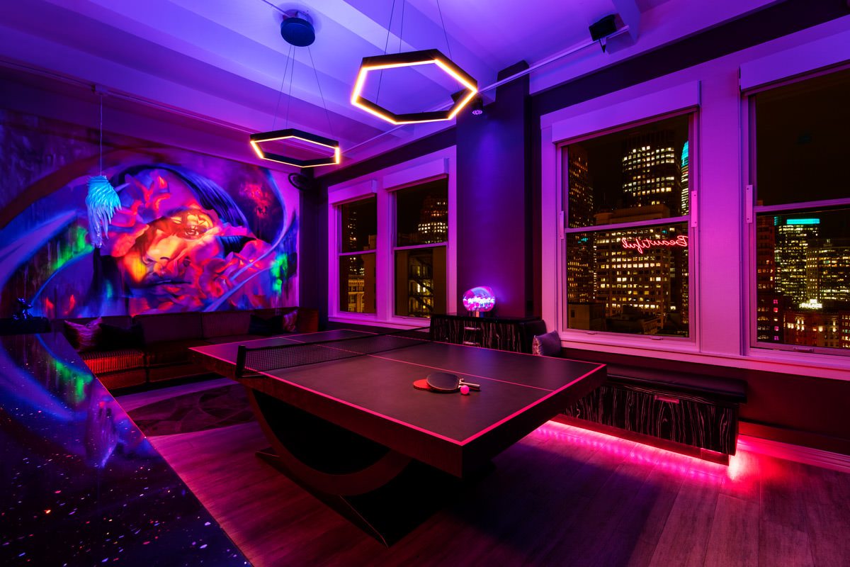 Mabrie Facial Institute's Lounge with ping-pong table, snacks, and city views.